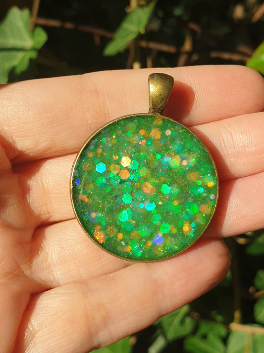 Pendentif vert pailleté